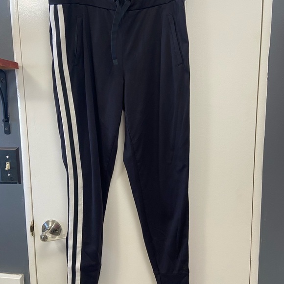 Athleta medium, zipper pockets, white stripes black joggers $75 - Picture 5 of 7
